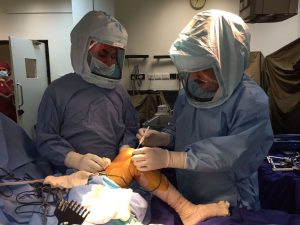 Dr. Mohit Arora doing knee surgery